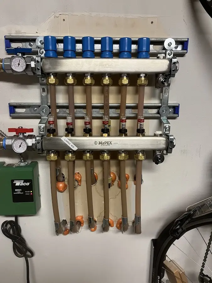 Plumber performing Water Heater Repair at a residential property in Hamptonburgh